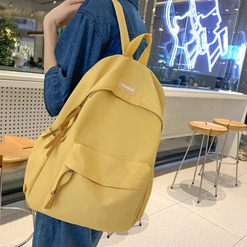 Корейский Простой рюкзак для женщин, нейлоновая простая сумка для книг большой емкости, модная повседневная однотонная сумка для учащихся средней школы.
